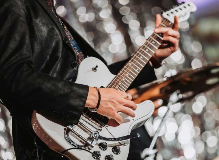 Shades of Blue Guitar Player