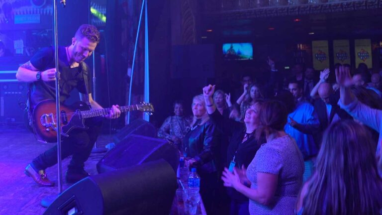 Shades of Blue Lead Guitarist Aidan with Excited Crowd